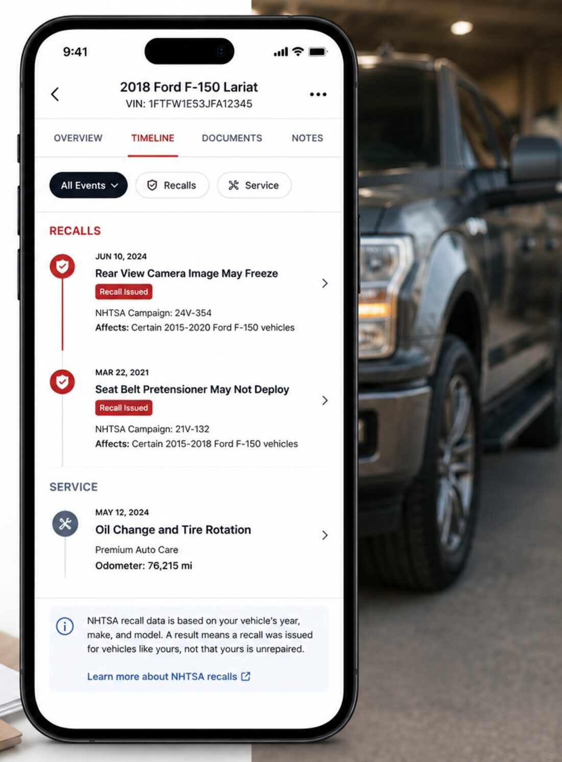A phone showing a vehicle's timeline with two manufacturer recalls listed above its service history, each with its NHTSA campaign number.